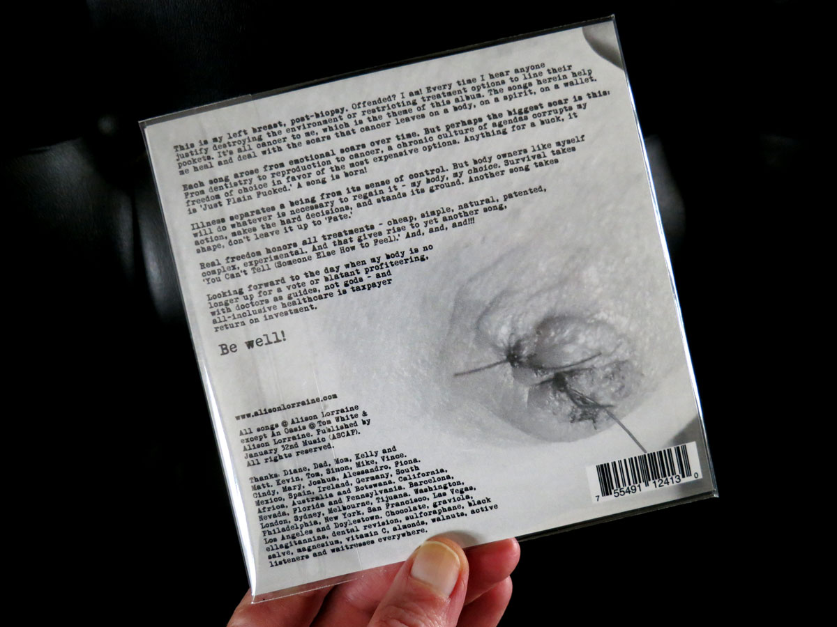Songs in the Key of Big C - CD Back Cover on Black Background